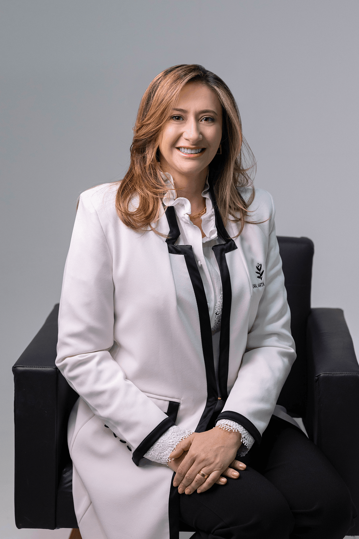 Dra. Marta Bereta em seu consultório